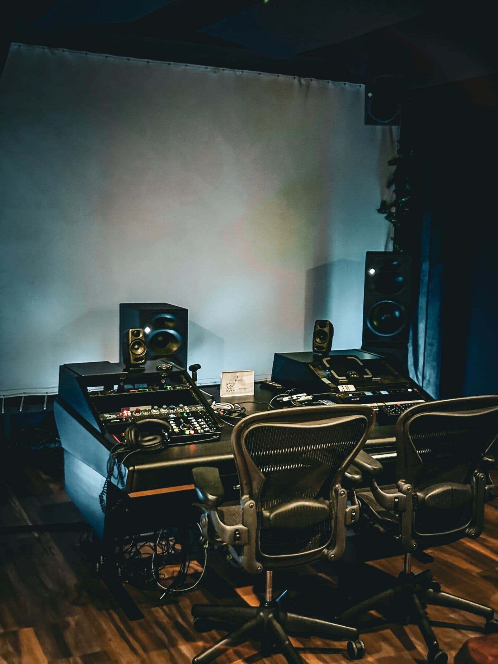 The mix position with twin Neumann monitor stacks and outboard gear at the console